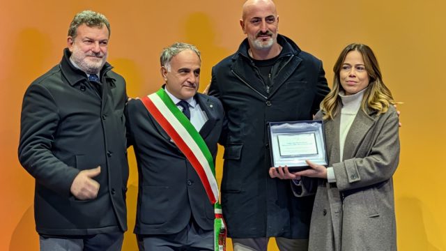 fiaccola olimpica a terni premiati biribanti e snatini terni volley