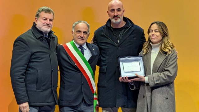 fiaccola olimpica a terni premiati biribanti e snatini terni volley